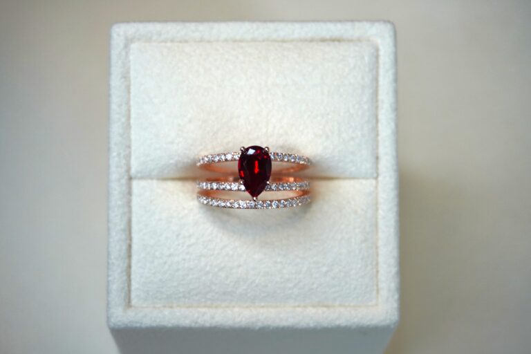 Ruby and 3-row Diamond Ring